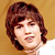 Static 50x50 pixel icon showing a person with brown hair against a solid background, rendered in low-resolution pixel art style.