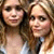 Two women with long brown hair stand side-by-side against a bright yellow background, blue text reads "MK & Ashley" on the right.