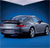 Pixelated silver sedan with red taillights on a blue gradient background, viewed from a low angle.