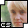 Pixelated portrait of a person with light hair against green background, featuring 'CS' text in white block letters on black rectangle at bottom left.