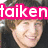 four shows a person with brown hair and dark clothing, overlaid with colored text: pink 'taiken', green 'by', orange 'Clay Aiken' in the bottom-left