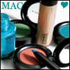 Static image of various makeup products including eyeshadow compacts, a foundation bottle, and a blue container with visible text "MAC" in the background.