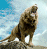 A lion stands on a rock against a blue sky with clouds, with text below reading FOR NARNIA in black and blue letters.