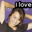 A person with brown hair in a black shirt poses against a purple background, displaying text overlays that change across frames.