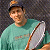 A pixelated contact sheet showing two frames of an animated icon featuring a person holding a tennis racket on the left and green text reading "Original Icons .com" on the right against a dark background.