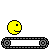 Yellow smiley face on a gray conveyor belt, moving from left to right