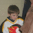 A pixelated image shows a person in sports attire holding a hockey stick, with bold text reading "Hockey Rules" on the right side.