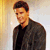 Three distinct pixelated images of a young man in different poses and backgrounds, each with unique clothing and expressions.