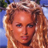 Static 48x48 pixel icon showing a close-up of a person with curly light brown hair against a blue background, rendered in low-resolution pixel art style.