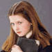 nine showing a person with long brown hair in various poses, each overlaid with orange text reading 'Ginny Weasley' against different background colors