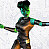 Pixelated figure with green-tinted face and dark hair, arms extended horizontally, wearing dark top with orange-brown torso section, standing against light gray background.