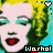 Pixelated image of a stylized face with blonde hair, turquoise eyes, red lips, and a turquoise background with heart symbols.
