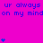 A bright pink background displays repeated blue text 'ur always ur always on my mind' with scattered blue heart symbols in various quantities.
