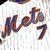 six pixelated images showing a baseball player in various poses and settings, including a Mets jersey, a cap, and a trophy