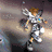 Two side-by-side animated frames show a character in silver armor with orange hair and blue accents, transitioning from a neutral stance to an action pose.
