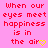 Pink background with red pixelated text reading 'When our eyes meet happiness is in the air' and a yellow heart symbol replacing the letter 'o' in 'air'.