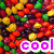 Pixelated collage of candy, abstract shapes, and text overlays with 'me', 'cool', and 'rocks<' in distinct colors.