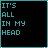 12 black square with cyan borders, each displaying the text "IT'S ALL IN MY HEAD" in cyan and white pixelated font, where some letters are replaced by heart symbols