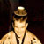 Static pixelated image of a person wearing a hat and sunglasses with a dark background, appearing as an AOL Instant Messenger buddy icon.