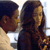 Static 50x50 pixel icon showing two people in close proximity with dark hair and light skin tones, rendered in low-resolution pixel art style with visible dithering and color blending.