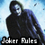 Two side-by-side pixelated figures in dark hooded cloaks with white masks against a blue sky background, each displaying 'Joker Rules' text below.