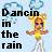 Pixelated image with text "Dancin in the rain" on left and dancing figure on right against light blue background.