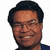 Pixelated image of a person with short dark hair and glasses, next to bold text reading "Wana grab a smoothie?" on white background.