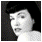 nine pixelated portrait images showing a woman with dark hair in various poses and expressions, some in color, others grayscale