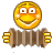 Pixelated yellow circular face with white eyes and orange blush, holding brown accordion-like object with gold buttons
