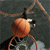 Pixelated static image of a basketball with visible seams and partial black-and-white details against a dark background.