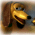 Pixelated cartoon dog with long brown ears, yellow face, blue eyes, and open mouth showing teeth and tongue, set against a muted background.