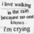 A static grayscale image displays pixelated text reading 'I love walking in the rain because I'm crying' across five lines on a white background.
