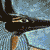 Pixelated icon featuring ancient Egyptian-style stone carvings and text reading 'The Temple of Netjer' in purple and blue lettering on a yellow gradient background.