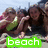 A beach scene with people in swimwear holding inflatable tubes, overlaid with text labels.