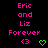 Pixelated text and symbols on a black background with pink and green elements, showing repeated patterns of 'Eric and Liz Forever' and heart icons.