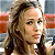 A 50x50 pixel buddy icon featuring a split composition with a person on the left and green text on the right, displayed as part of an animated contact sheet.