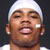 Pixelated static image of a person wearing a white headband with closed eyes and visible facial features including ears, nose, mouth, and skin tone.