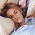 A split-frame contact sheet showing a woman lying down on the left and green text reading "Original Icons .com" on the right, both in pixelated style.