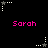 Pixelated animation shows white star icons with dotted trails rotating clockwise around pink "Sarah" text on black background.