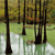 Pixelated static image of vertical dark brown tree trunks in a shallow body of water with greenish-yellow foliage background.
