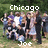 Group photo of people outdoors with text overlays, showing a static image with no animation.