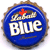 Static circular blue icon with brown border featuring Miller Lite branding and a red plus sign above the text.