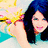 Pixelated image of a person with dark blue hair holding up a hand near their face against a colorful abstract background.