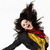 Animated sequence showing a person with dark hair in dynamic poses against white and red backgrounds, wearing a black top with yellow and red accents.