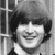 Black-and-white collage of four John Lennon images with text overlay reading "Lennon - McCartney" in bold pixelated font.