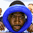 Pixelated image of a person wearing a blue hooded garment with dark hair visible at the top, surrounded by partial pixelated figures on the left and right edges.
