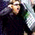 A pixelated contact sheet showing two frames of an animated icon with a person on the left and green text on the right against a dark background.