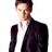 Pixelated static image of a person in formal attire with brown hair and neutral expression against white background.
