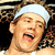 Two side-by-side animated frames of a person wearing a white tank top and light blue headband, with visible facial expressions and body posture differences between the left and right frames.
