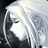 Pixelated grayscale image of a person's face in profile, showing closed eyes and long hair against dark background.